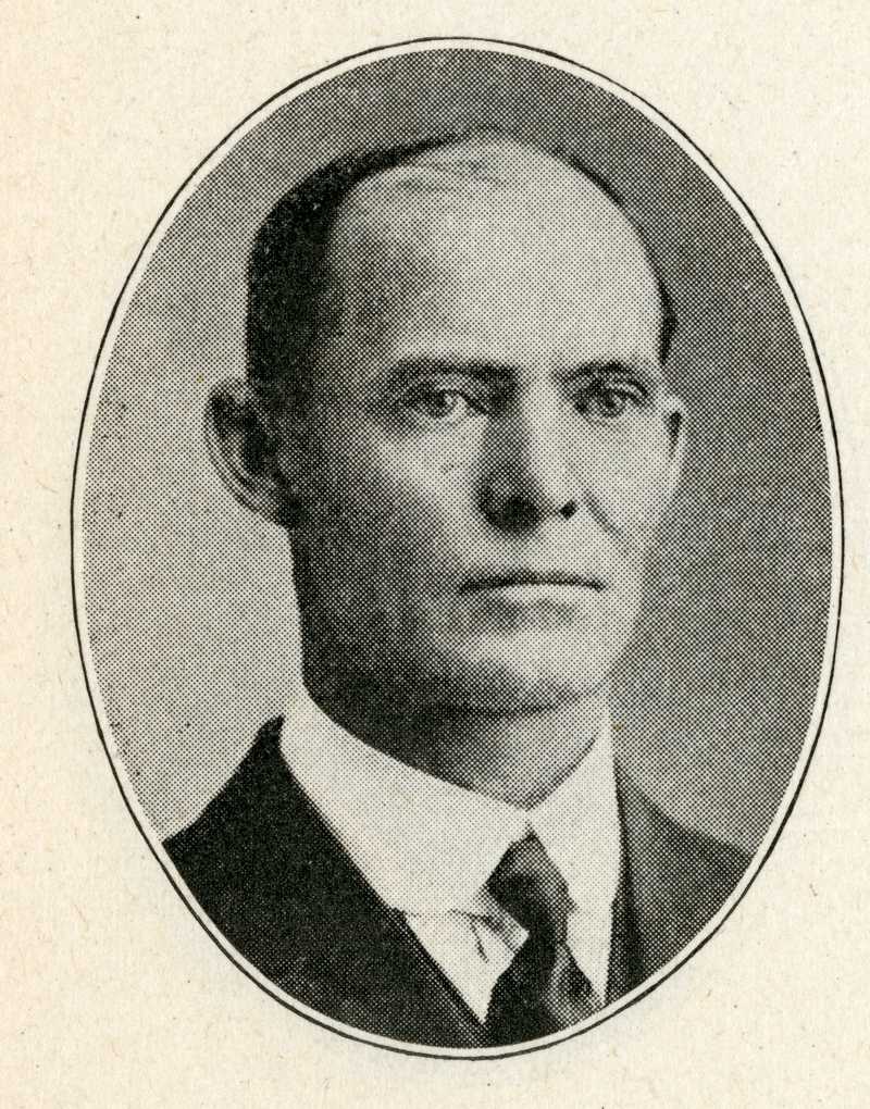 Photo of James E. Madigan